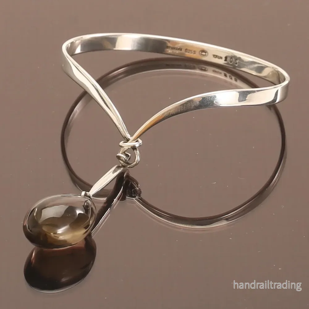 Vivianna Torun Bülow Hübe – Armring, silver and stone pendant Vivianna Torun Bülow Hübe – Armring, silver and stone pendant